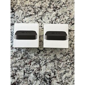 2 empty Apple TV boxes  no Apple TV included